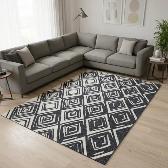 Black And Ivory Geometric Washable Area Rug With UV Protection Photo 2