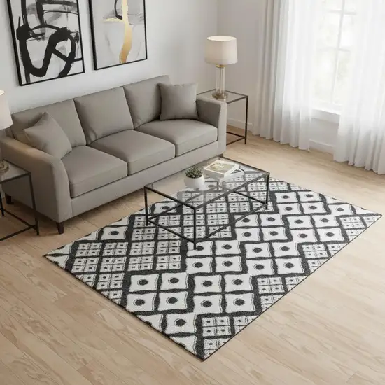 Black And Ivory Geometric Washable Area Rug With UV Protection Photo 1
