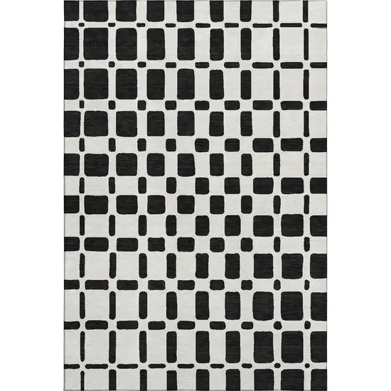 Black And Ivory Geometric Washable Area Rug With UV Protection Photo 1