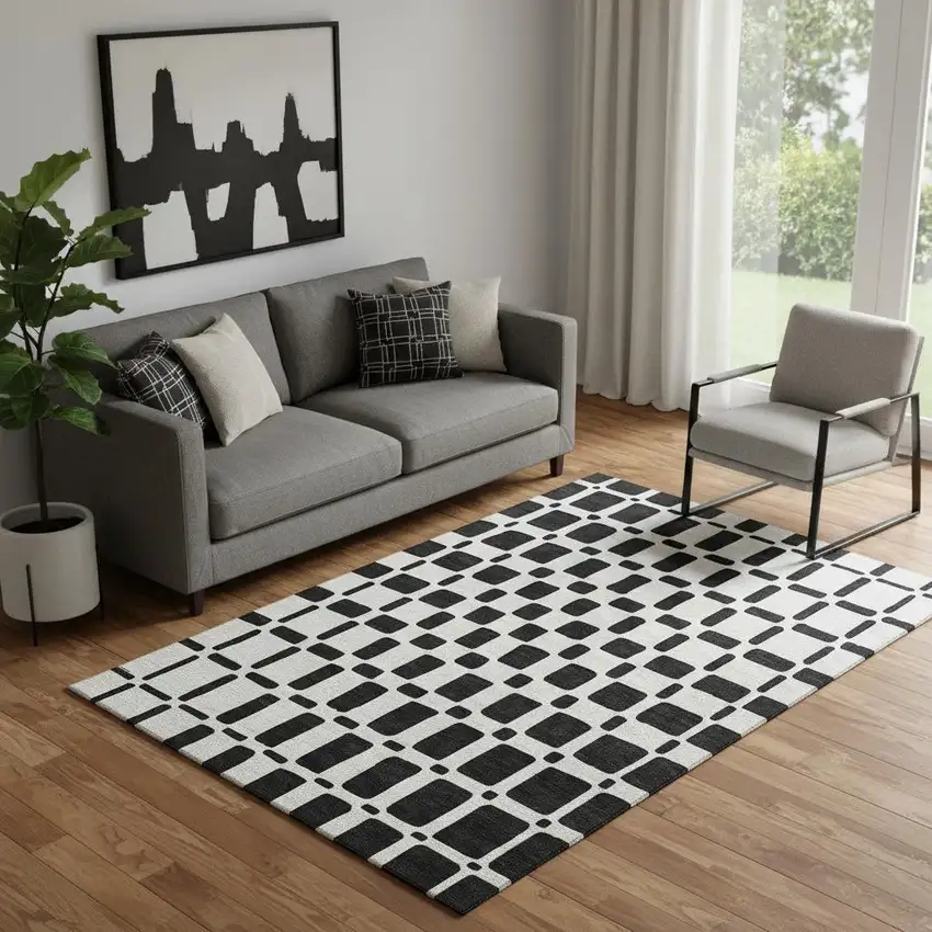 Black And Ivory Geometric Washable Area Rug With UV Protection Photo 1