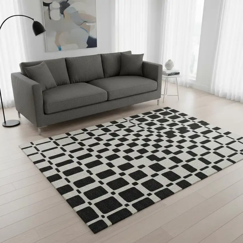 Black And Ivory Geometric Washable Area Rug With UV Protection Photo 2