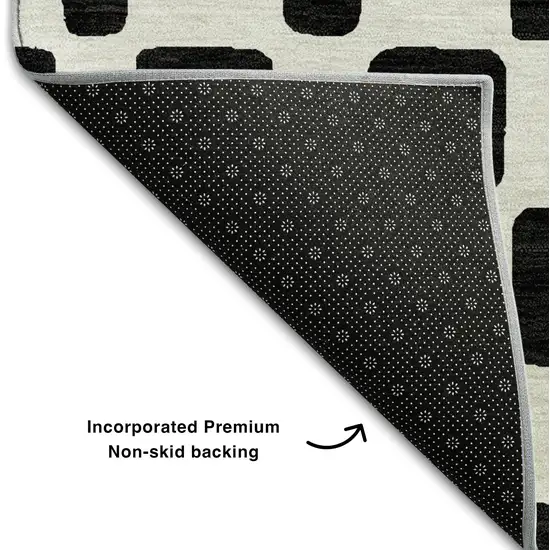 Black And Ivory Geometric Washable Area Rug With UV Protection Photo 7