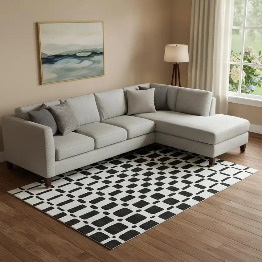 Black And Ivory Geometric Washable Area Rug With UV Protection Photo 1