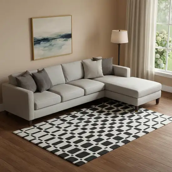 Black And Ivory Geometric Washable Area Rug With UV Protection Photo 1