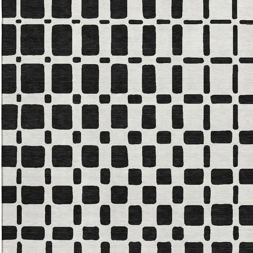 Black And Ivory Geometric Washable Area Rug With UV Protection Photo 4