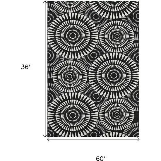 Black And Ivory Geometric Washable Area Rug With UV Protection Photo 3