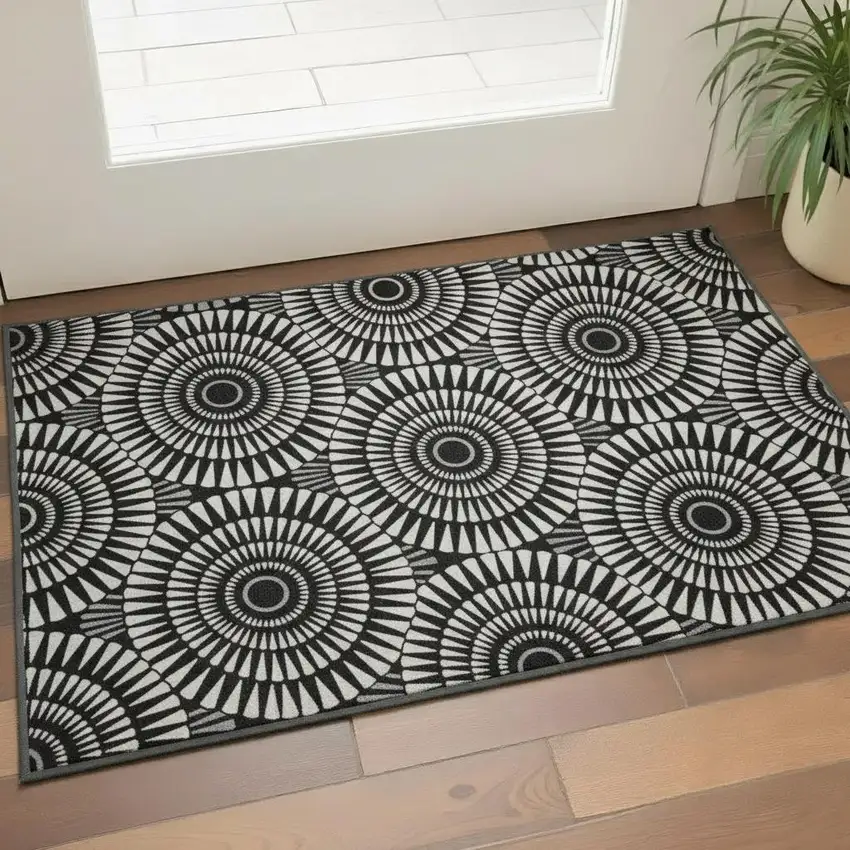 Black And Ivory Geometric Washable Area Rug With UV Protection Photo 2