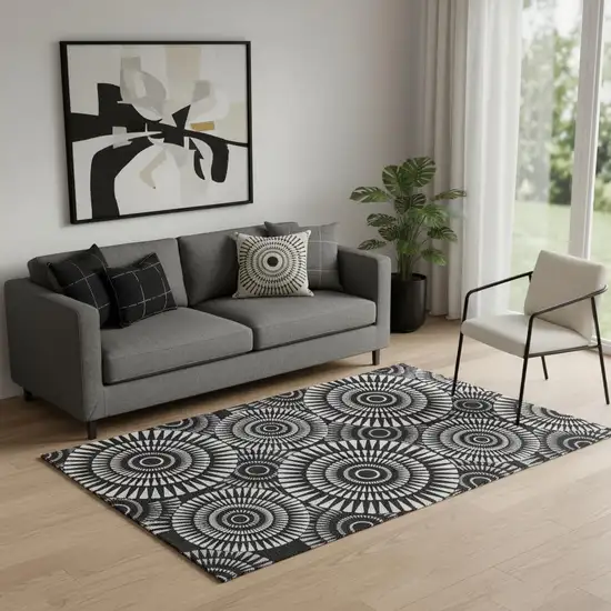 Black And Ivory Geometric Washable Area Rug With UV Protection Photo 1