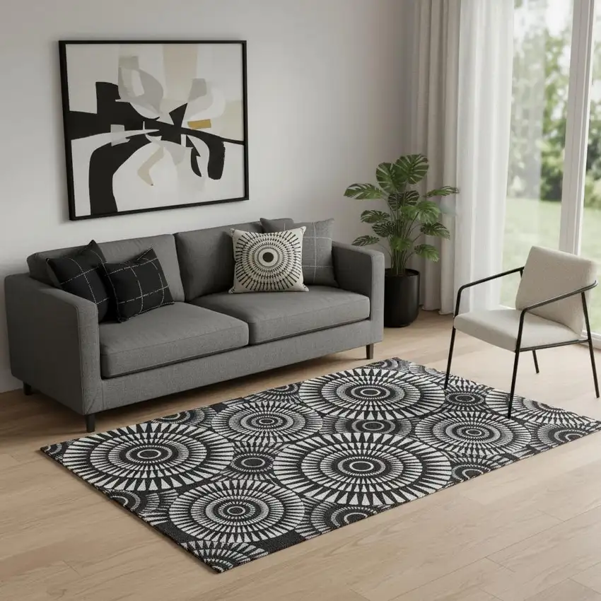 Black And Ivory Geometric Washable Area Rug With UV Protection Photo 1
