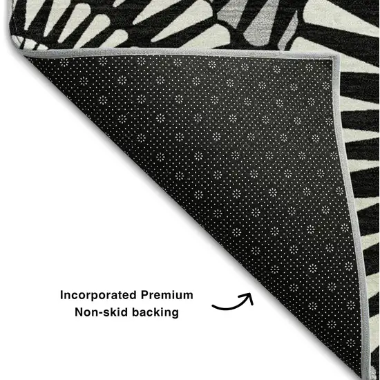 Black And Ivory Geometric Washable Area Rug With UV Protection Photo 7