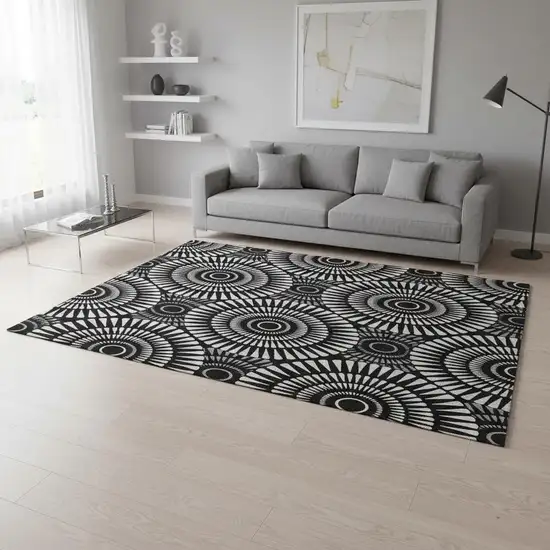 Black And Ivory Geometric Washable Area Rug With UV Protection Photo 2