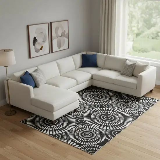 Black And Ivory Geometric Washable Area Rug With UV Protection Photo 1