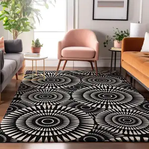 Photo of Black And Ivory Geometric Washable Area Rug With UV Protection