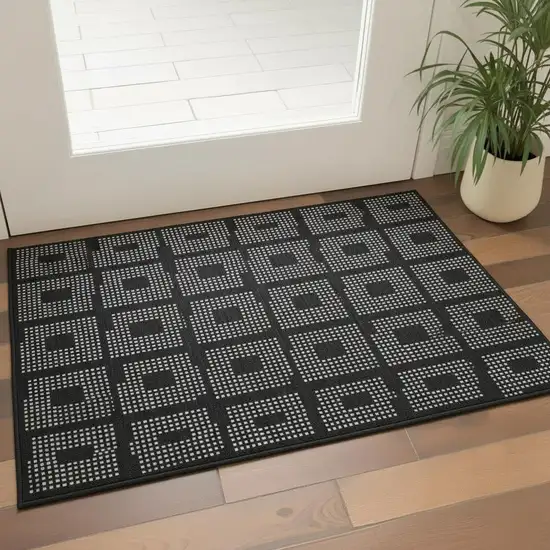 Black And Ivory Geometric Washable Area Rug With UV Protection Photo 2