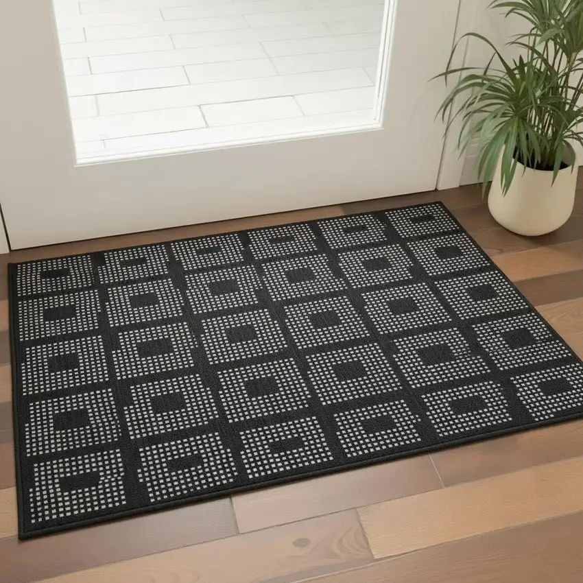 Black And Ivory Geometric Washable Area Rug With UV Protection Photo 2