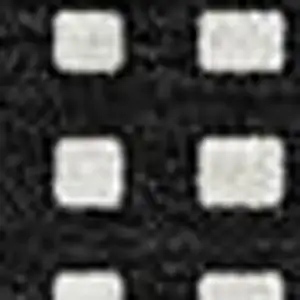 Photo of Black And Ivory Geometric Washable Area Rug With UV Protection