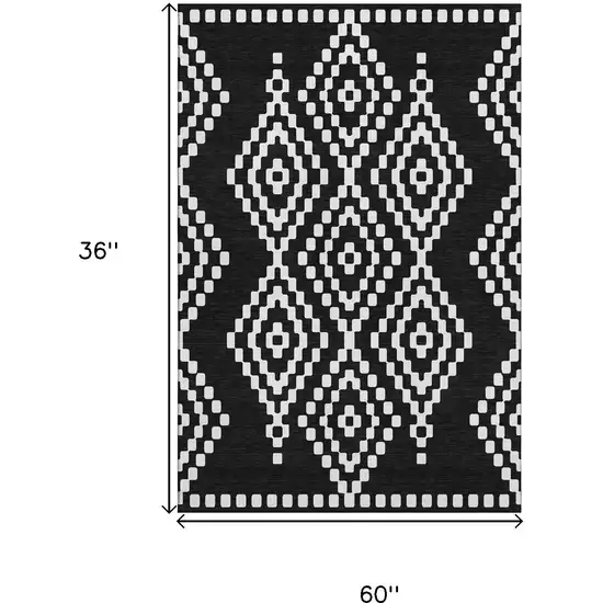 Black And Ivory Geometric Washable Area Rug With UV Protection Photo 3