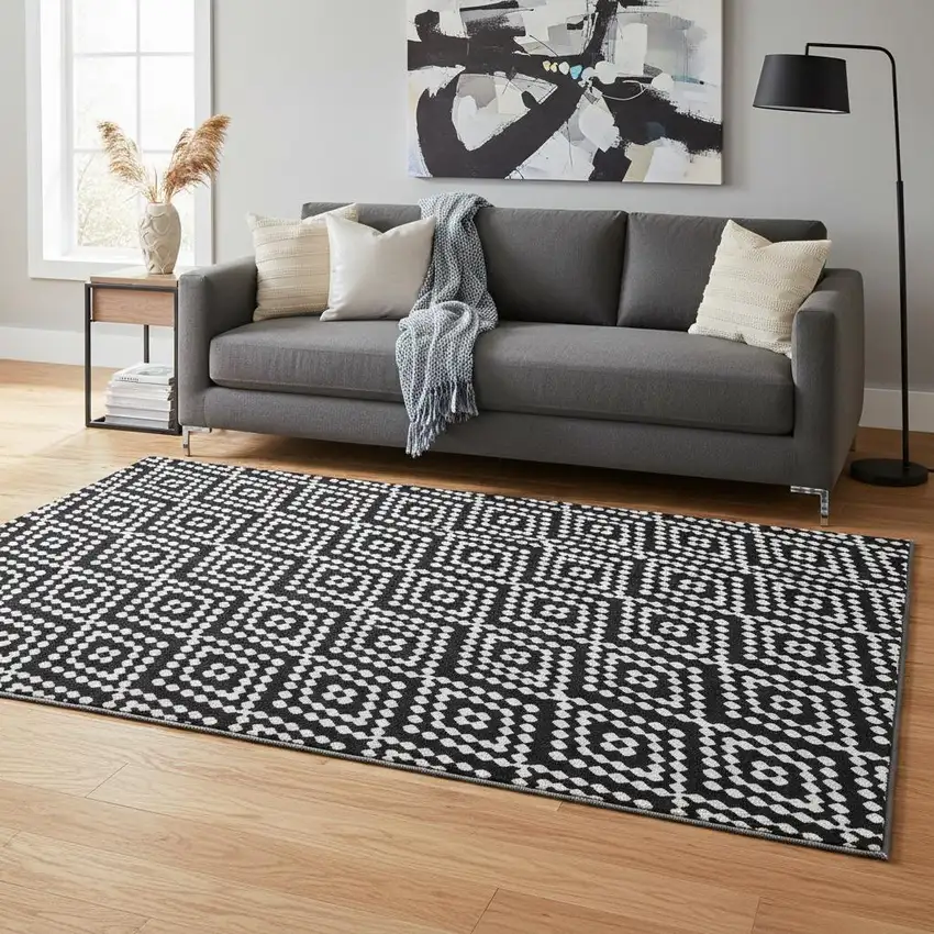 Black And Ivory Geometric Washable Area Rug With UV Protection Photo 2