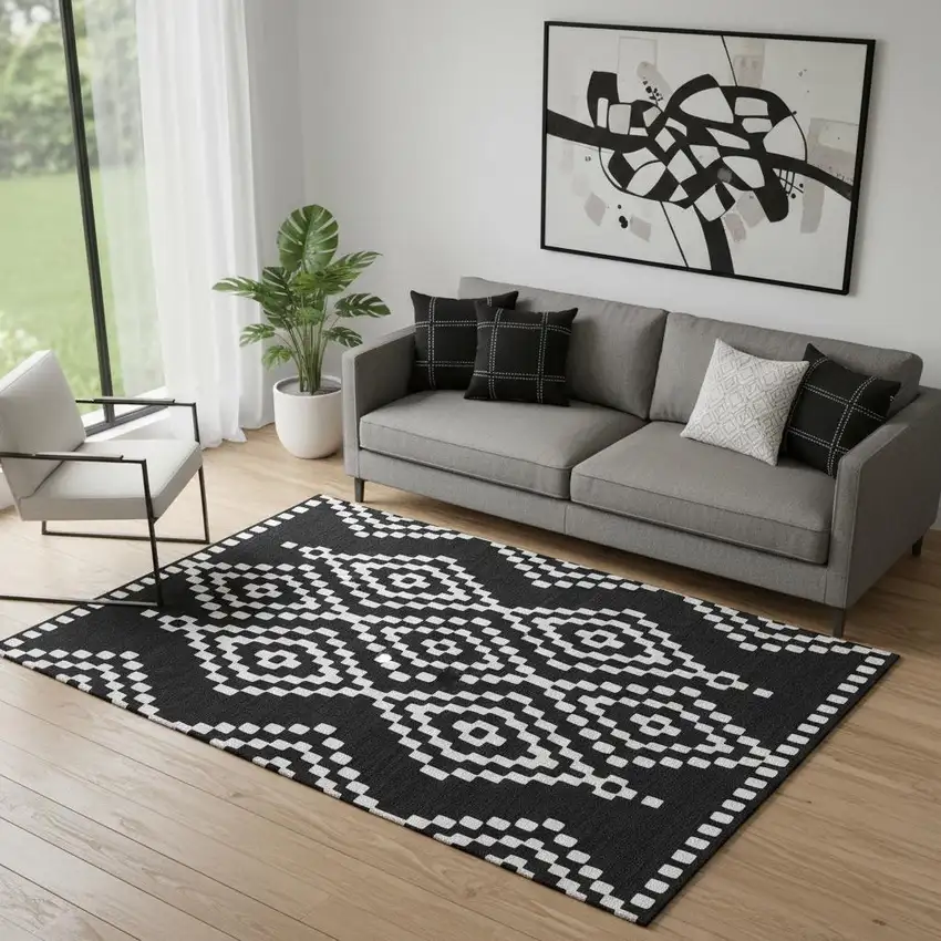 Black And Ivory Geometric Washable Area Rug With UV Protection Photo 1