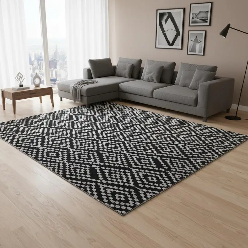 Black And Ivory Geometric Washable Area Rug With UV Protection Photo 2