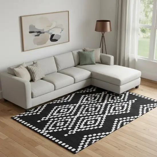 Black And Ivory Geometric Washable Area Rug With UV Protection Photo 1
