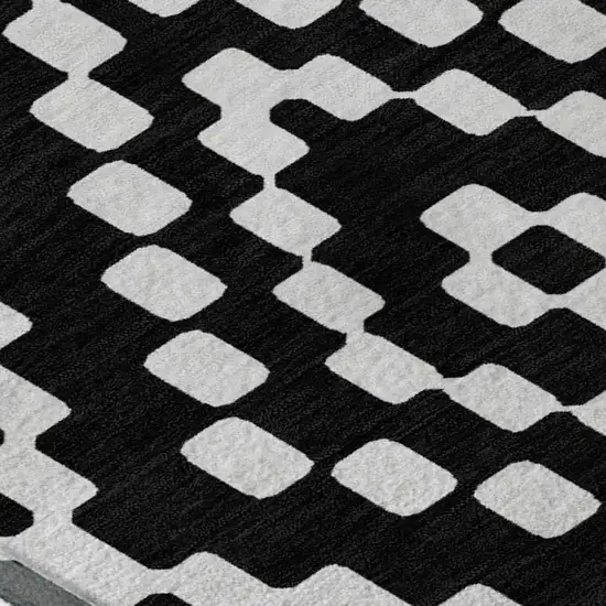 Black And Ivory Geometric Washable Area Rug With UV Protection Photo 3