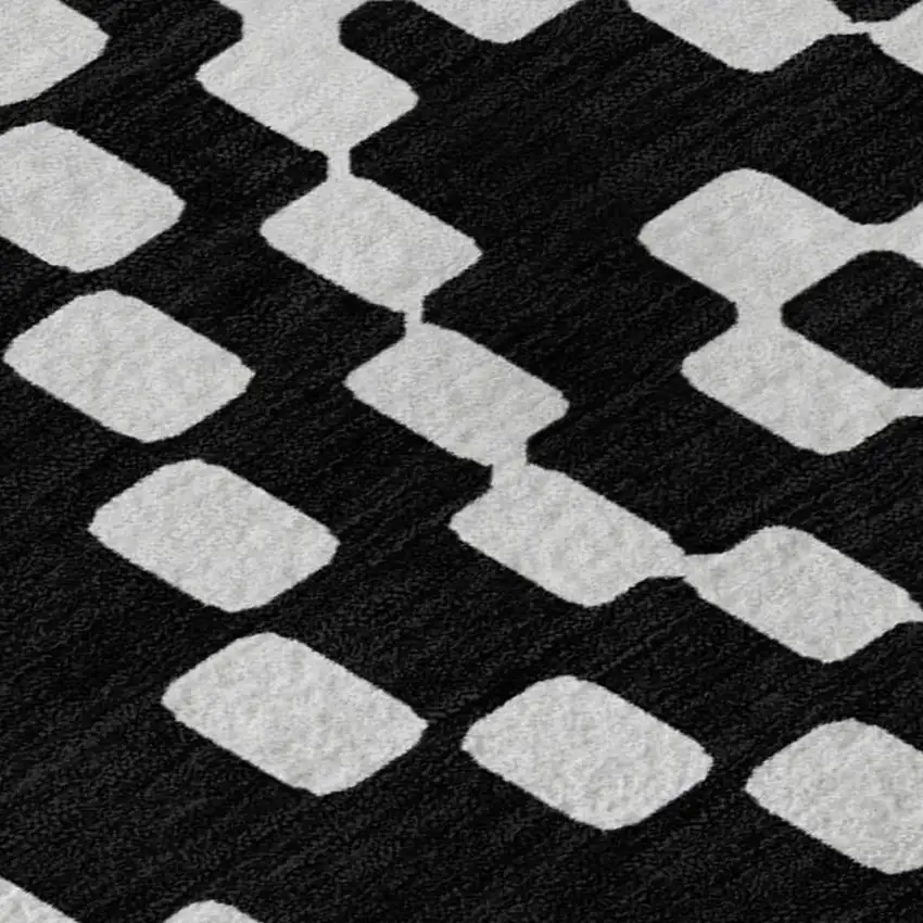 Black And Ivory Geometric Washable Area Rug With UV Protection Photo 3