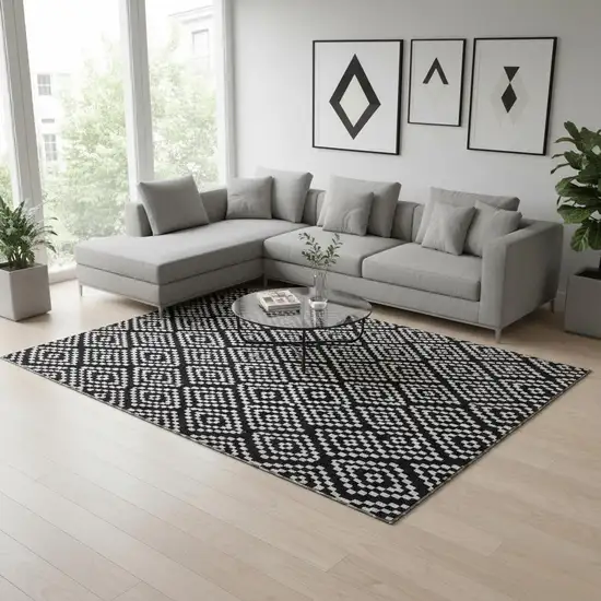 Black And Ivory Geometric Washable Area Rug With UV Protection Photo 2