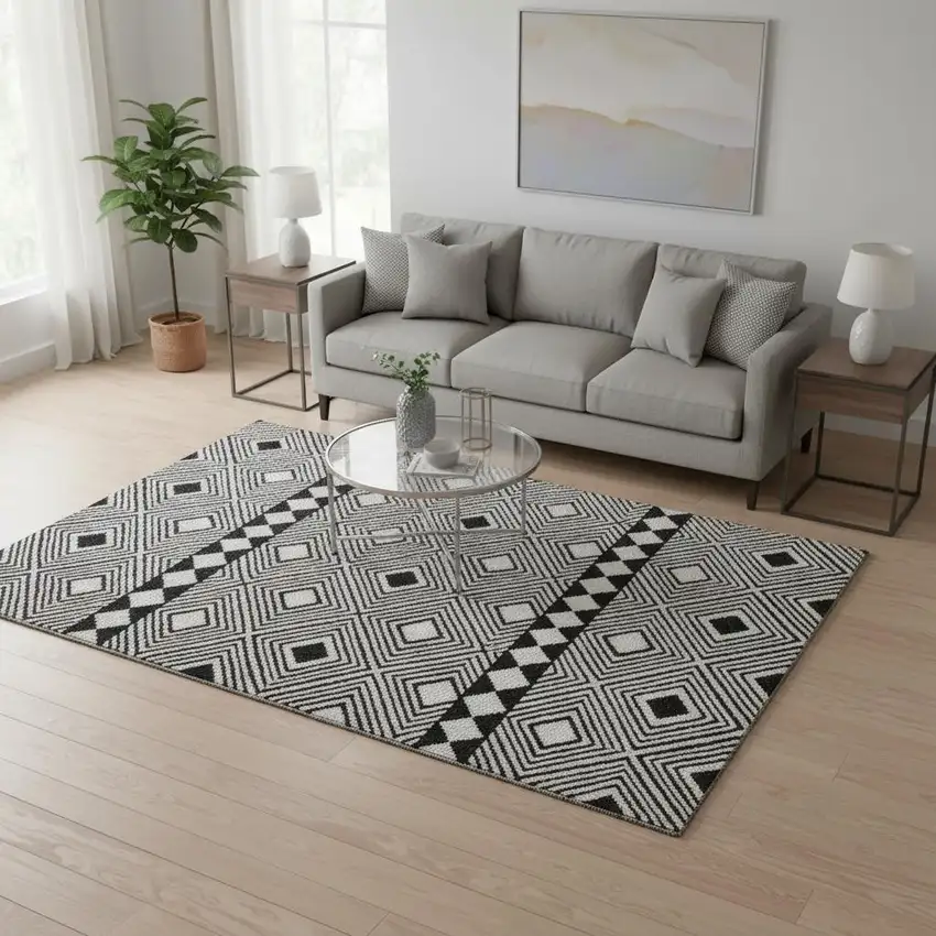 Black And Ivory Geometric Washable Area Rug With UV Protection Photo 2