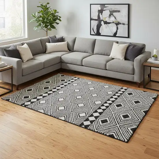 Black And Ivory Geometric Washable Area Rug With UV Protection Photo 2