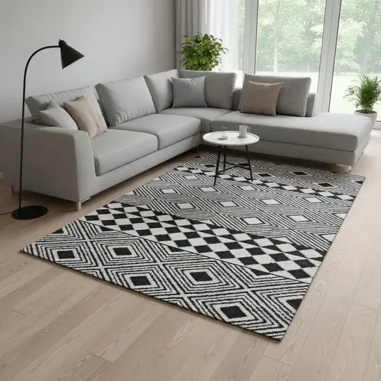 Black And Ivory Geometric Washable Area Rug With UV Protection Photo 2