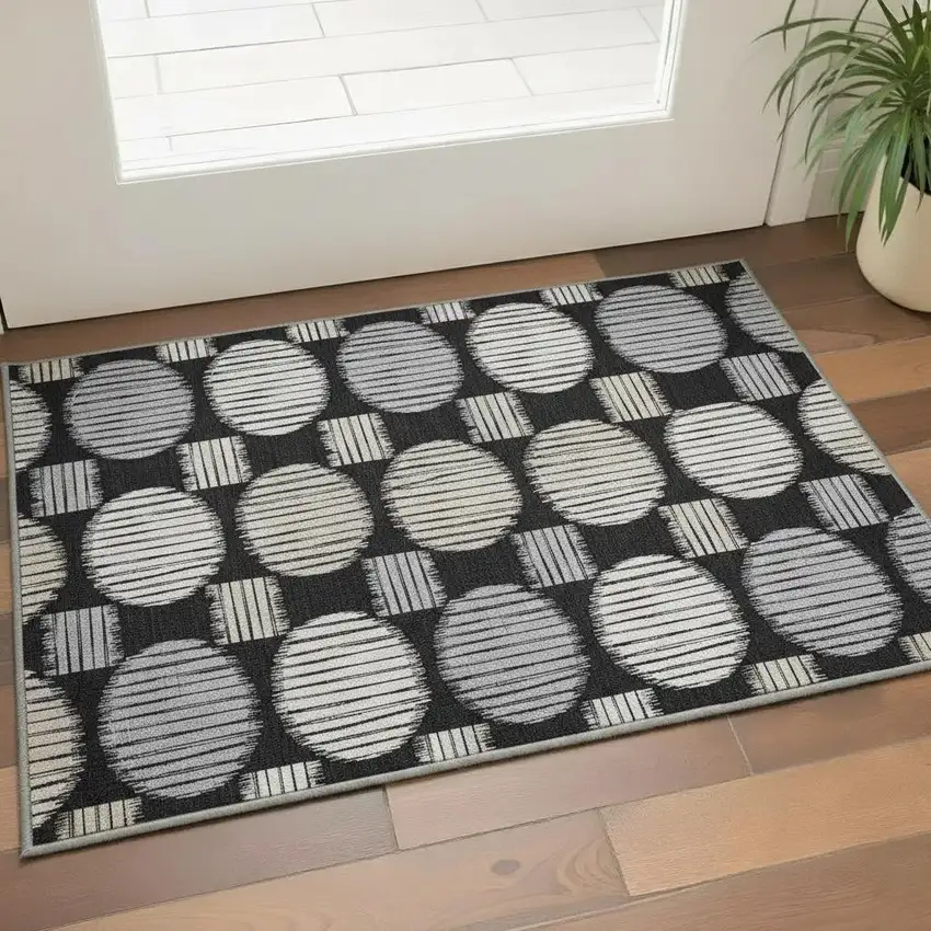 Black And Ivory Geometric Washable Area Rug With UV Protection Photo 2