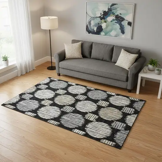 Black And Ivory Geometric Washable Area Rug With UV Protection Photo 2