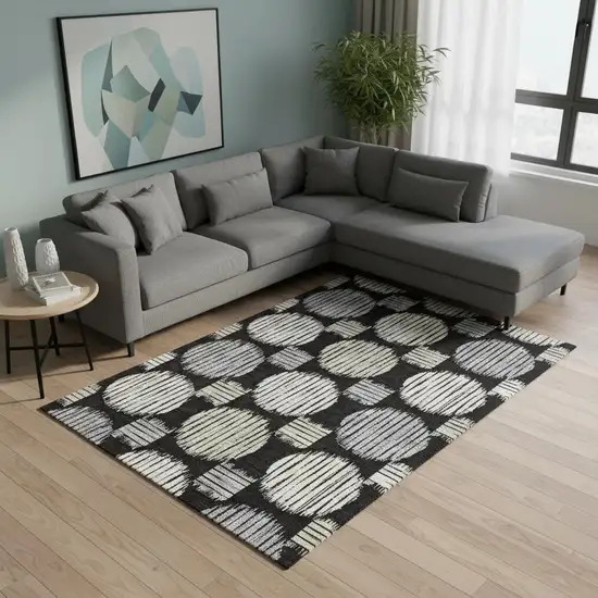 Black And Ivory Geometric Washable Area Rug With UV Protection Photo 2