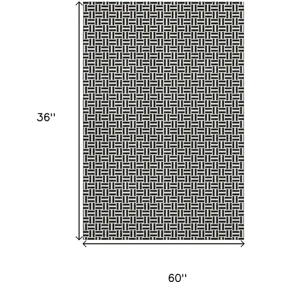 Black And Ivory Geometric Washable Area Rug With UV Protection Photo 3