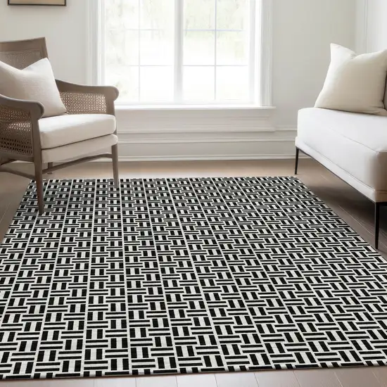 Black And Ivory Geometric Washable Area Rug With UV Protection Photo 6
