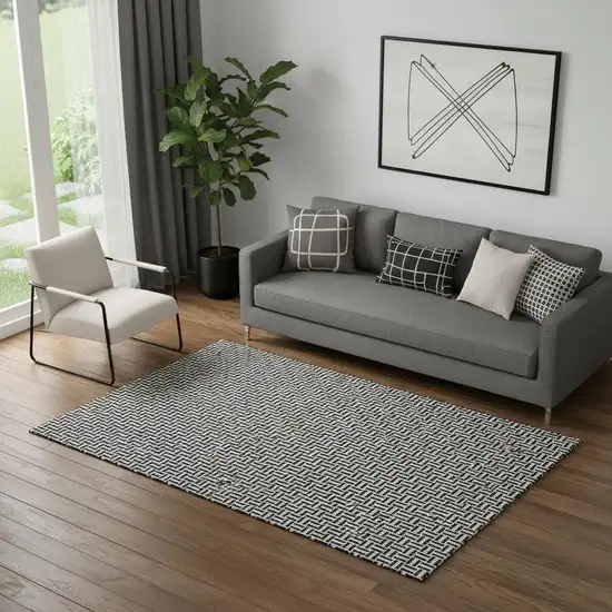 Black And Ivory Geometric Washable Area Rug With UV Protection Photo 1