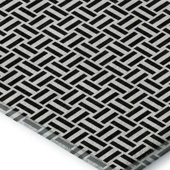 Black And Ivory Geometric Washable Area Rug With UV Protection Photo 4