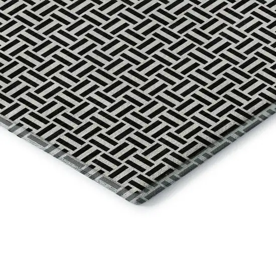 Black And Ivory Geometric Washable Area Rug With UV Protection Photo 1