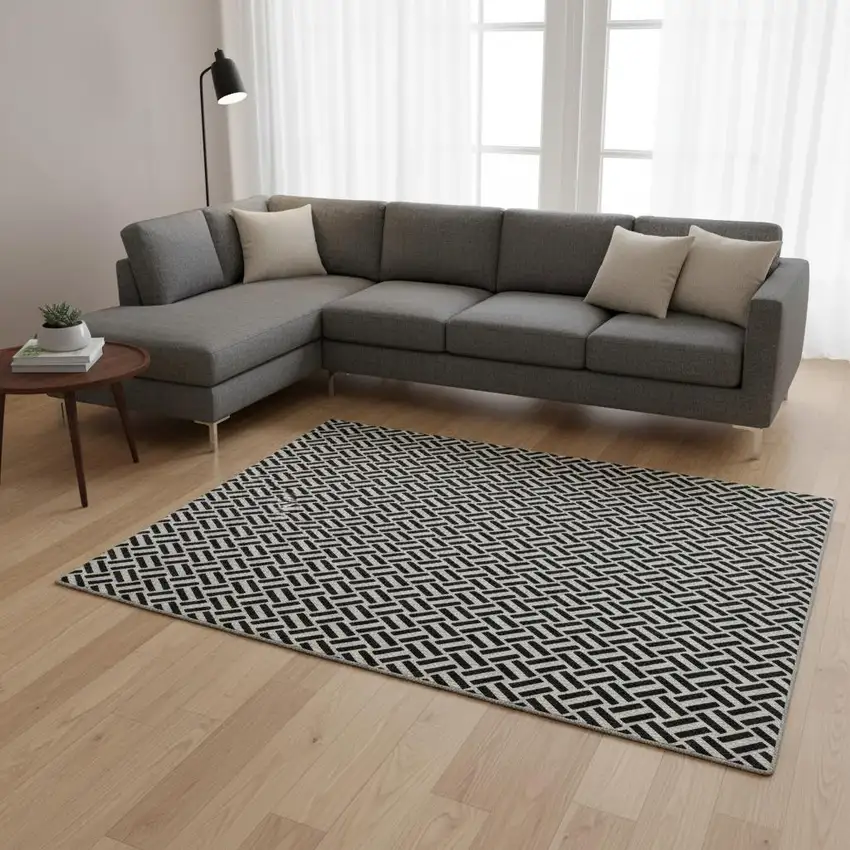 Black And Ivory Geometric Washable Area Rug With UV Protection Photo 2