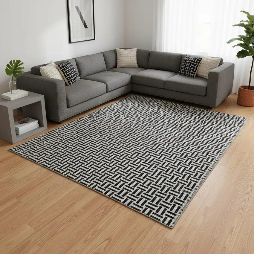 Black And Ivory Geometric Washable Area Rug With UV Protection Photo 2