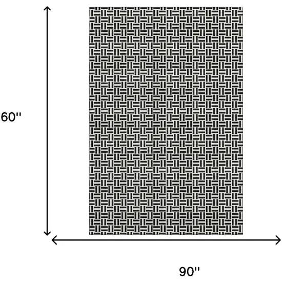 Black And Ivory Geometric Washable Area Rug With UV Protection Photo 3