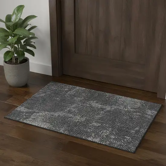 Black And Ivory Geometric Washable Area Rug With UV Protection Photo 1