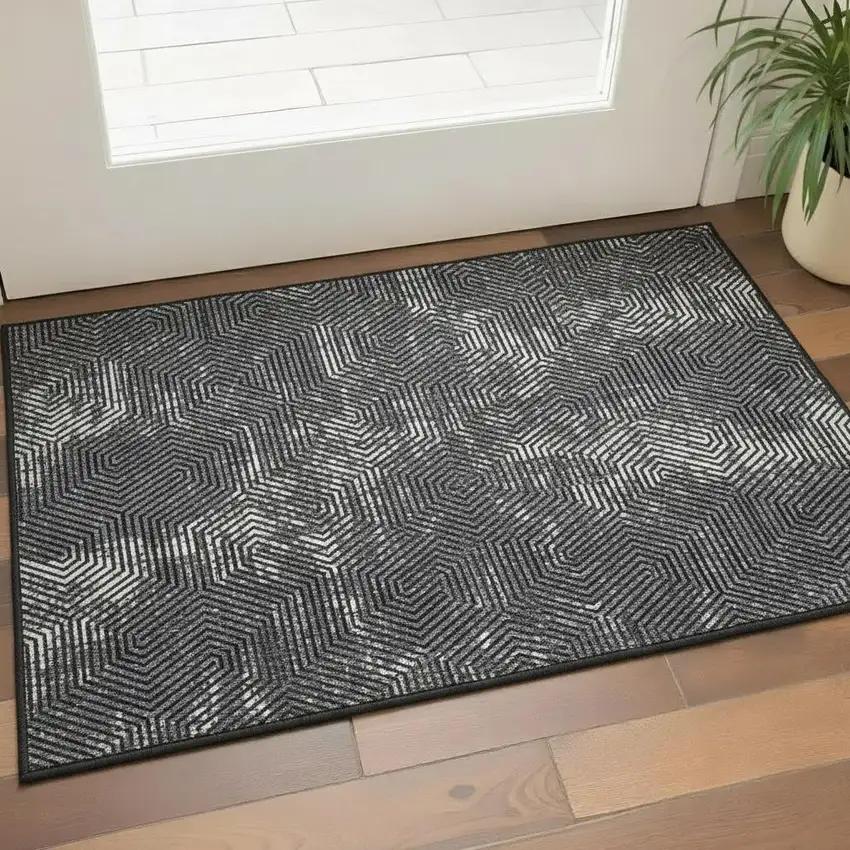 Black And Ivory Geometric Washable Area Rug With UV Protection Photo 2