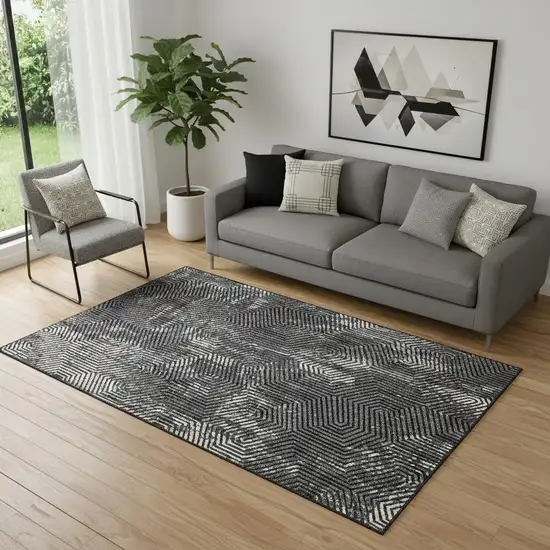 Black And Ivory Geometric Washable Area Rug With UV Protection Photo 1