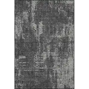 Photo of Black And Ivory Geometric Washable Area Rug With UV Protection