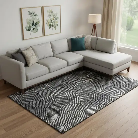 Black And Ivory Geometric Washable Area Rug With UV Protection Photo 1