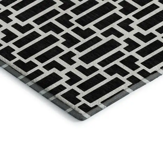 Black And Ivory Geometric Washable Area Rug With UV Protection Photo 4