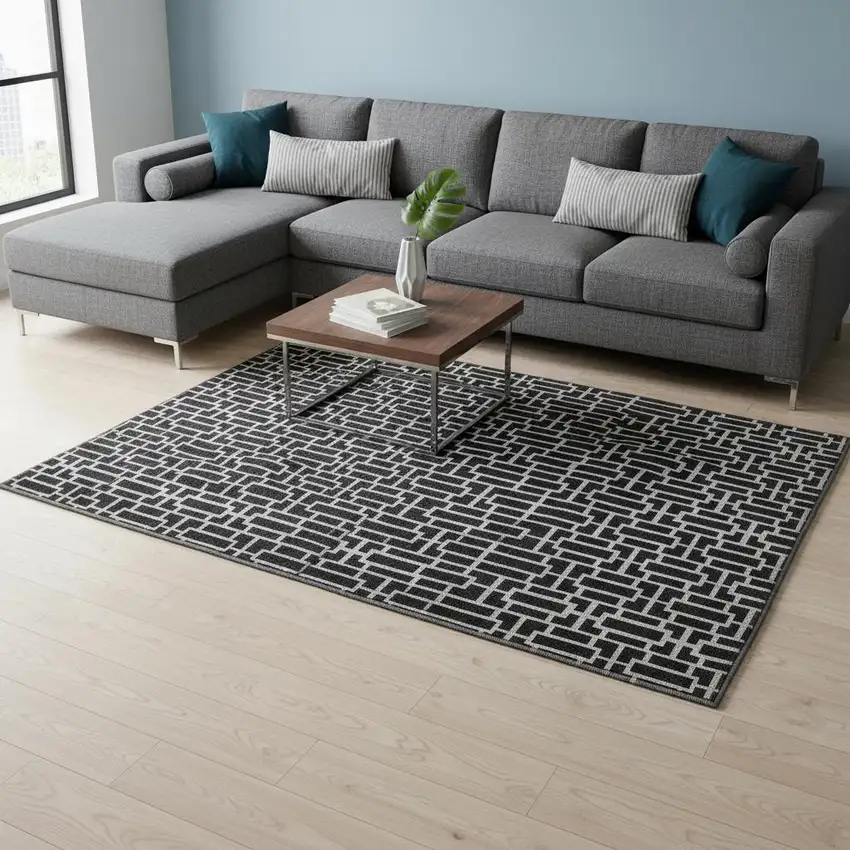 Black And Ivory Geometric Washable Area Rug With UV Protection Photo 2