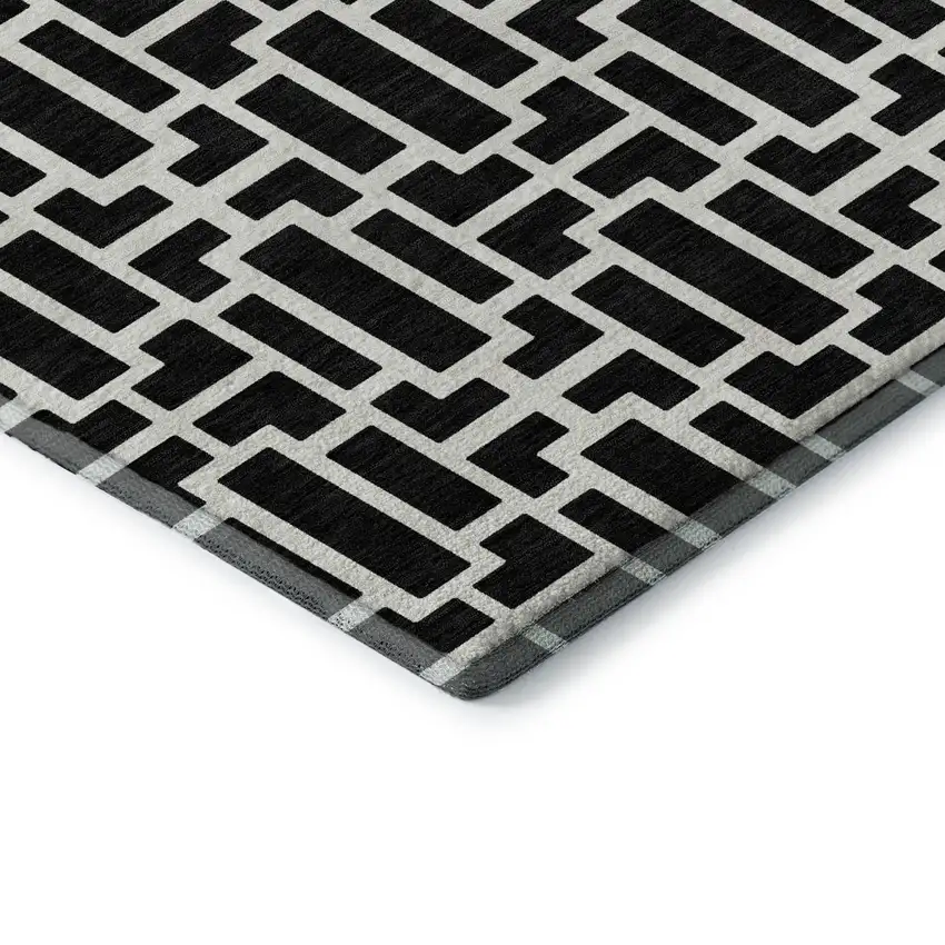 Black And Ivory Geometric Washable Area Rug With UV Protection Photo 1